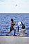 A frequent ocean breeze lets the kites fly high, Cuba