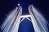 Petronas Twin Towers at full moon in Kuala Lumpur